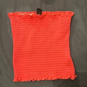 A hot pink tube top worn once , size small from hot kiss